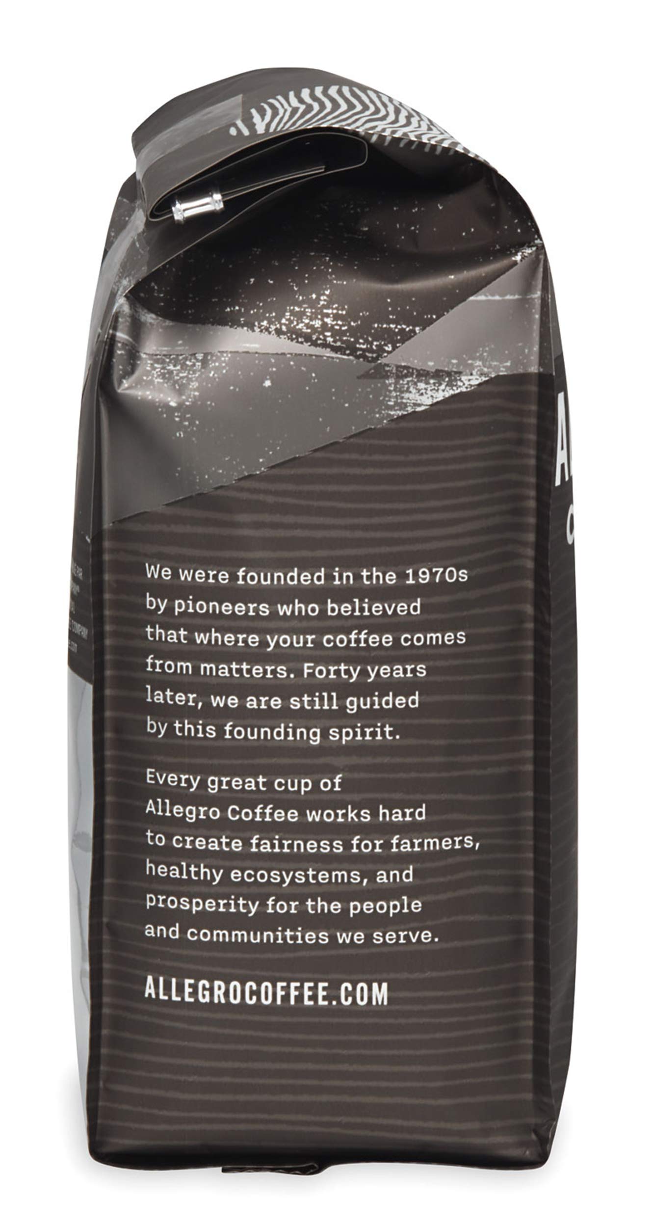 Close-up of Half Caff grounds releasing smoky aroma and subtle fruit notes.