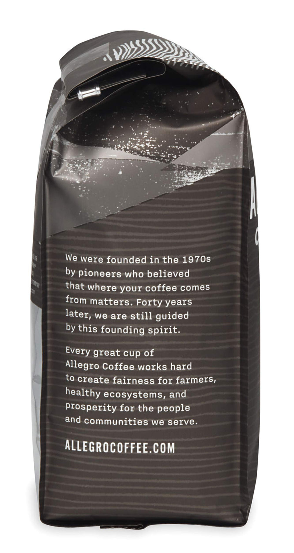 Close-up of Half Caff grounds releasing smoky aroma and subtle fruit notes.