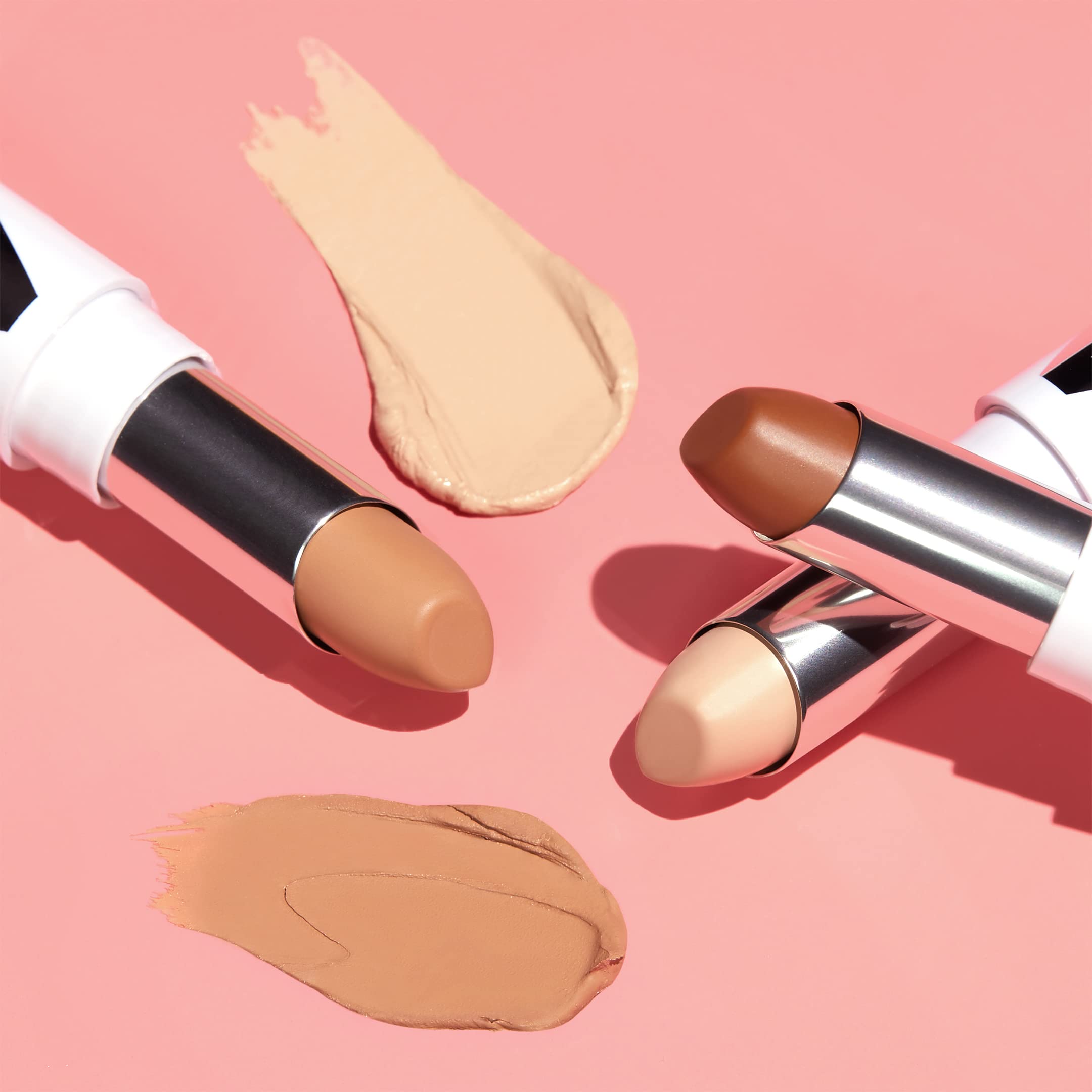 Applying Almay Skin Perfecting Comfort Concealer for crease-free camouflage.