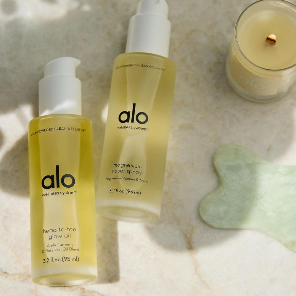 Alo magnesium oil spray with arnica and amla ingredients for soothing support.
