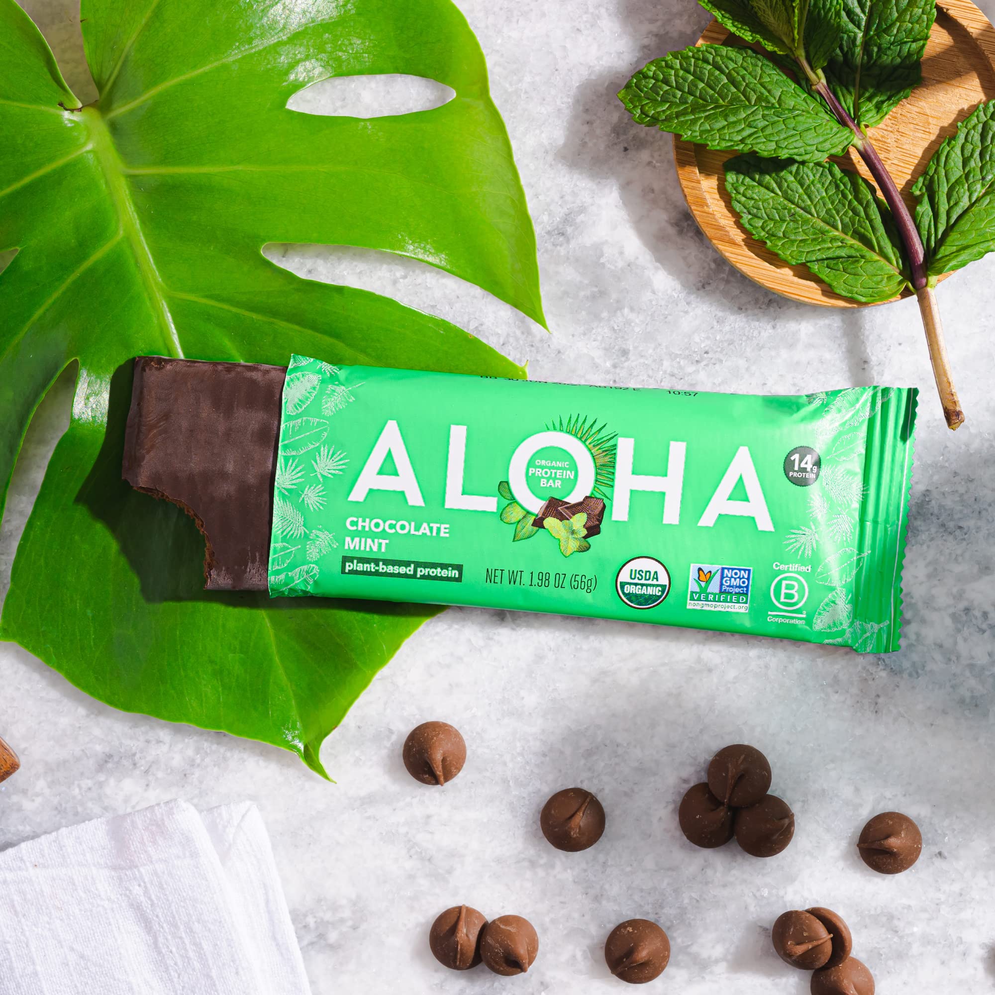 ALOHA dark chocolate chips on bar highlight indulgent flavor.