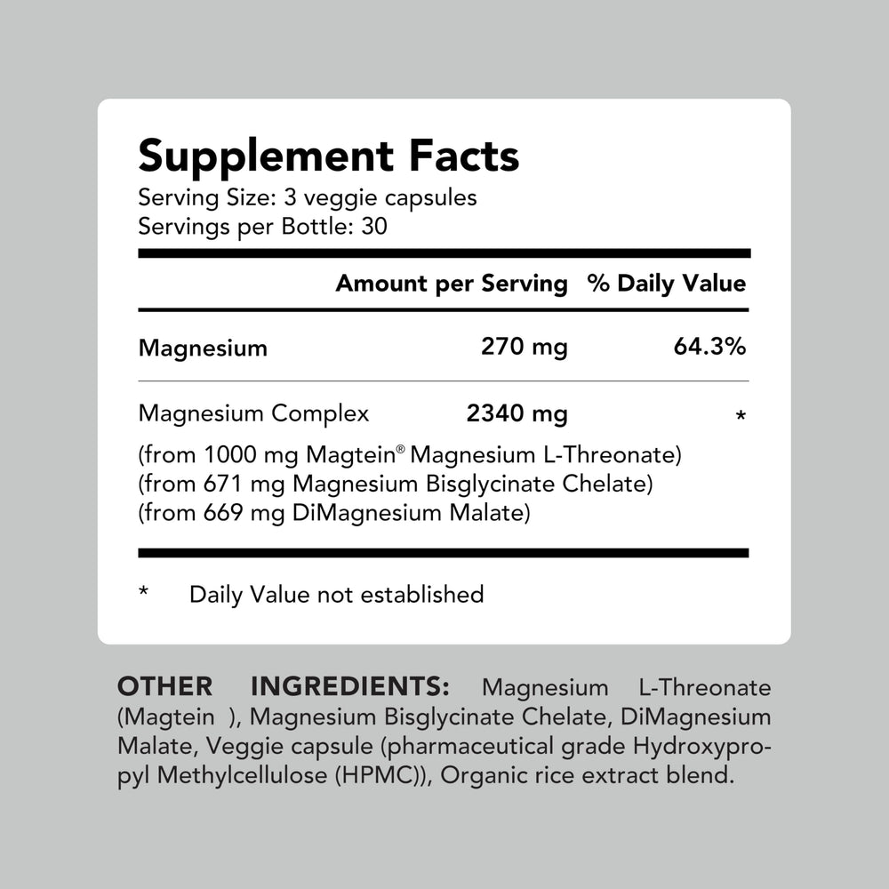 AMANDEAN Magtein bottle beside a glass of water, suggesting a simple nightly routine.
