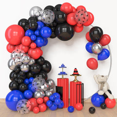Amandir spider-printed 12in balloons add playful focal points to decor.
