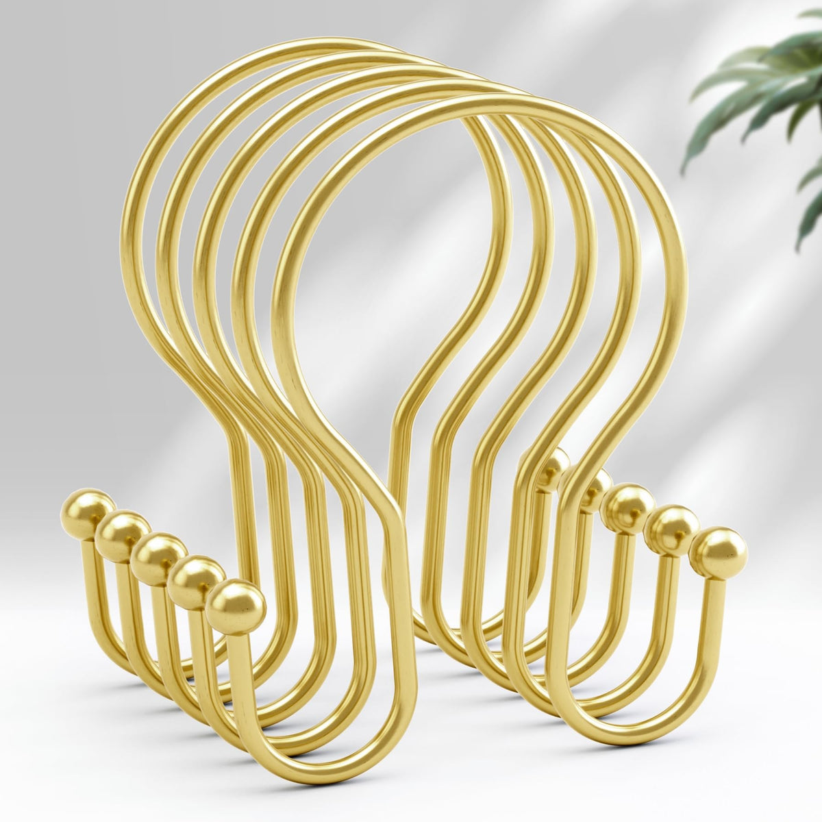 AmazerBath gold double-hook shower curtain hooks provide balanced hanging and rust-free use.