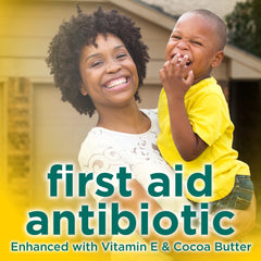 Amazon Basic Care ointment tube in hand for on-the-go first aid