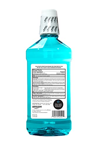 Amazon Basics antiseptic mouthwash being poured to support daily oral hygiene