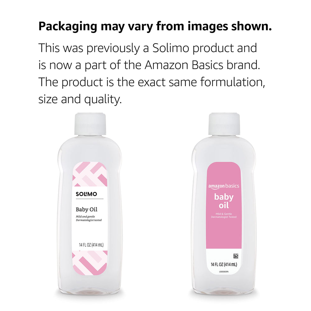 Amazon Basics Baby Oil label highlights a 14 oz size for family use.