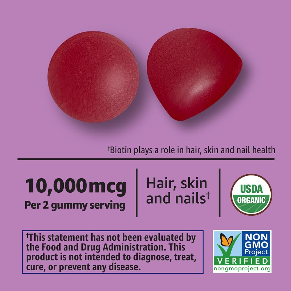 Amazon Basics Biotin gummies close-up highlighting cherry flavor and soft texture.