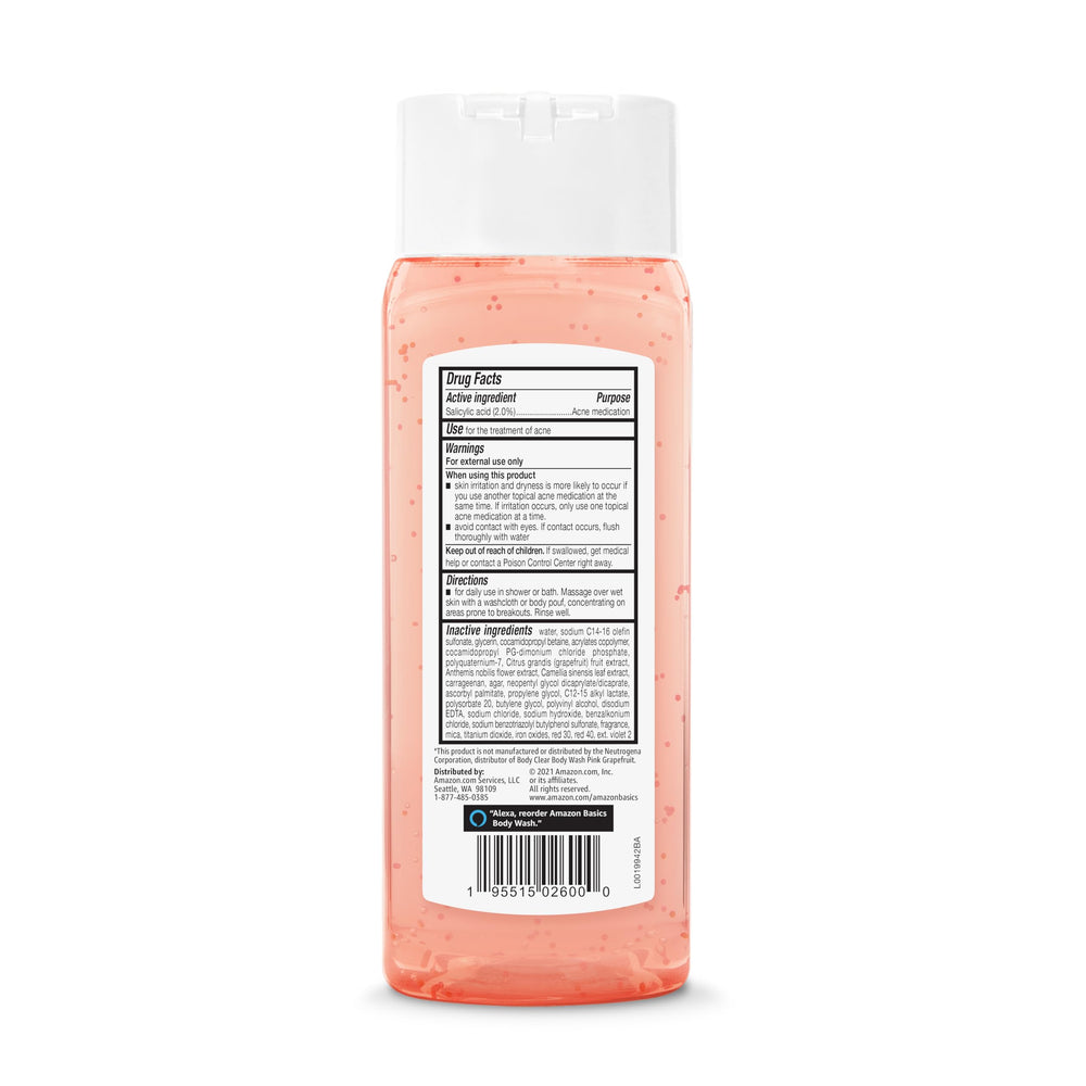 Amazon Basics Clarifying Pink Grapefruit Body Wash bottle pour for a refreshing cleanse.