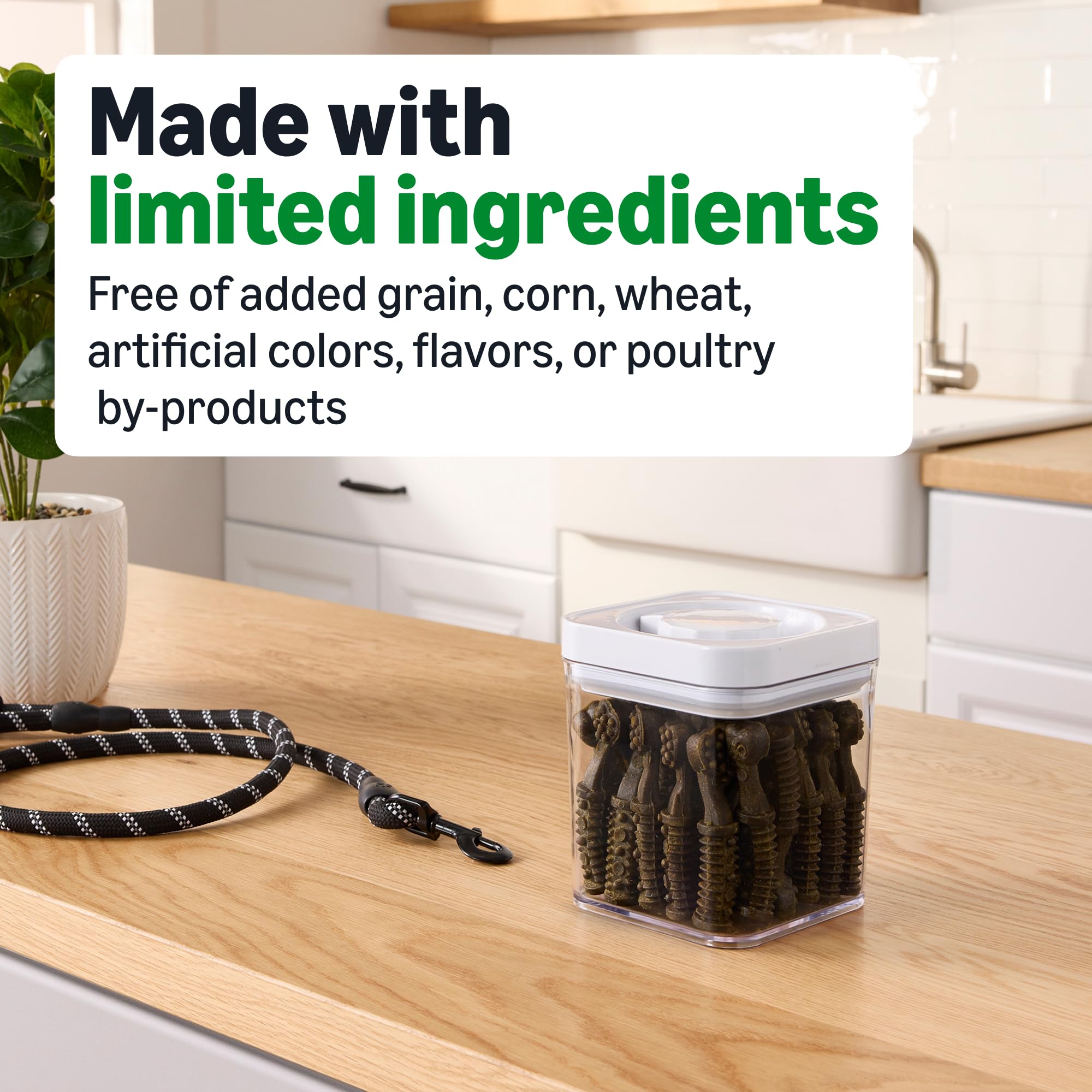 Chews in dog's mouth from Amazon Basics illustrating cleaning action.