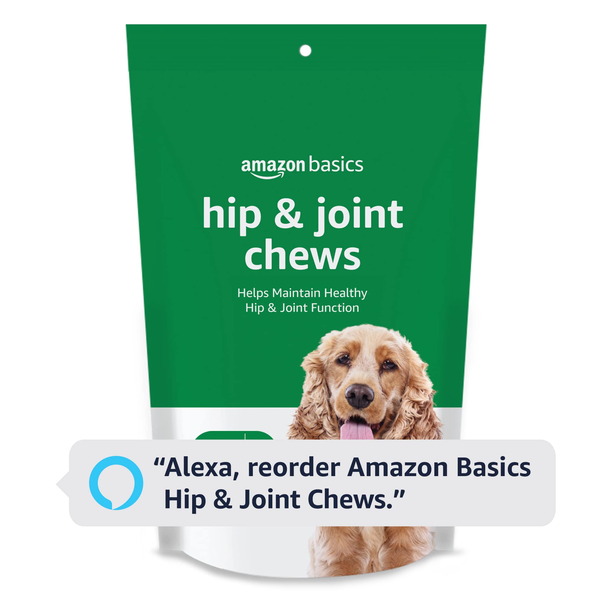 Dog enjoying an Amazon Basics hip joint chew on the couch.
