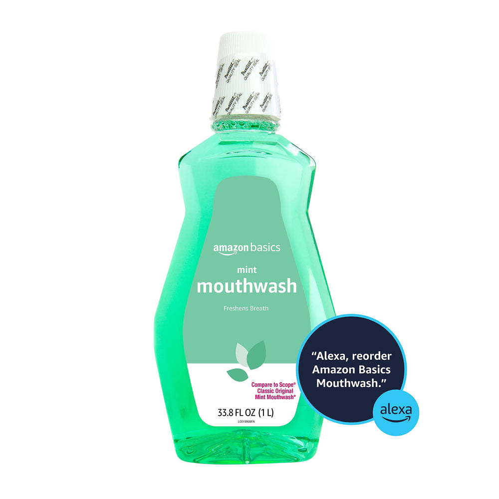 Amazon Basics Fresh Breath Mouthwash label closeup shows 33.8 oz bottle.