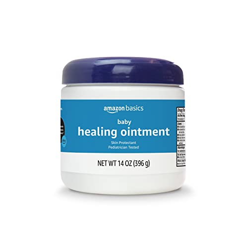 Amazon Basics Healing Ointment applied to baby's cheek for dry skin relief.