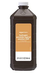 Pouring Amazon Basics Hydrogen Peroxide bottle demonstrating easy application