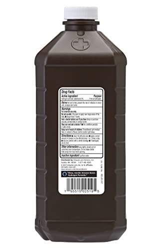 Closeup of Amazon Basics Hydrogen Peroxide label with 3% formula and paraben-free claim