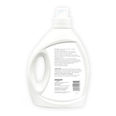 Amazon Basics detergent cap shown for easy measuring and loading.
