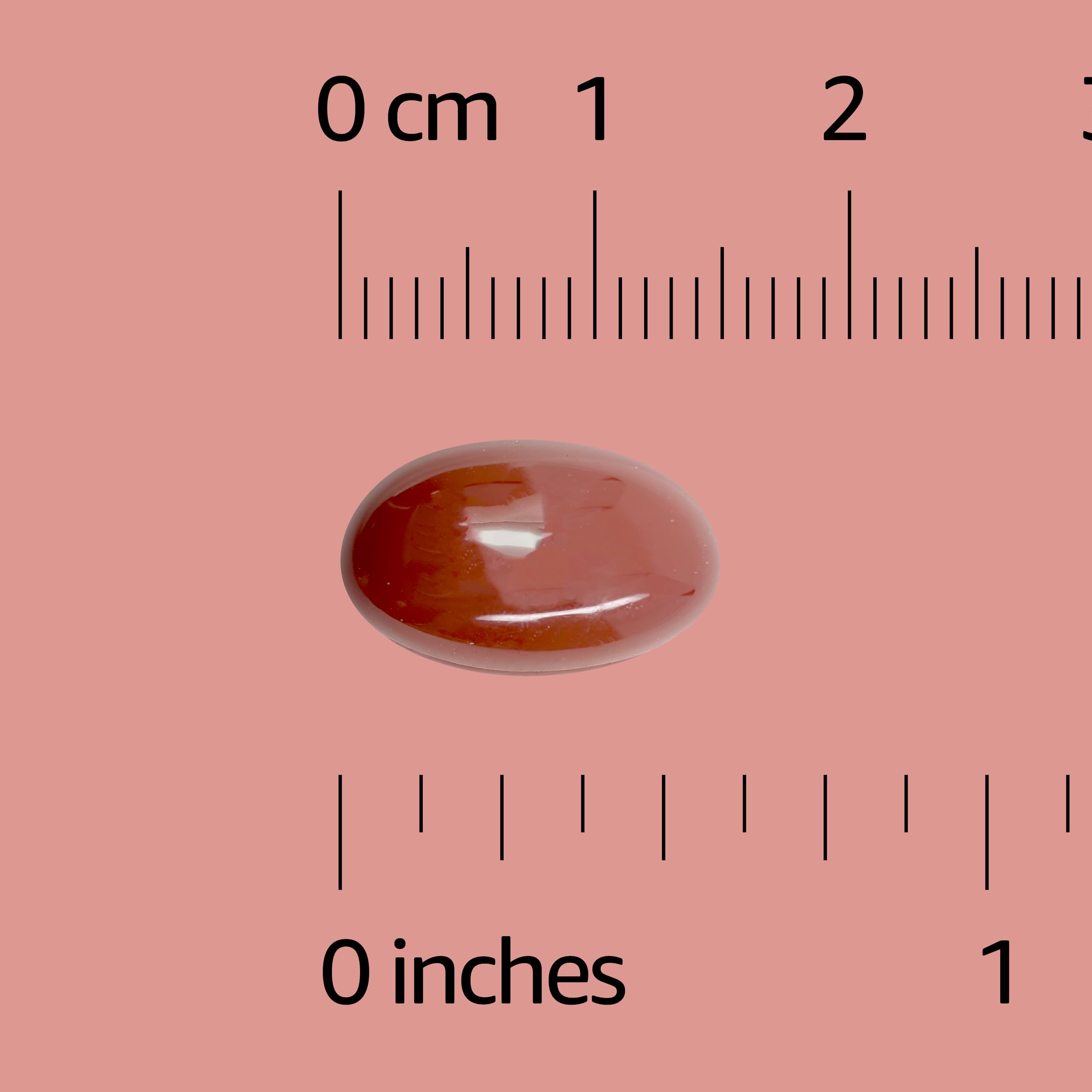 Closeup of Amazon Basics CoQ10 softgels capsules highlighting energy production