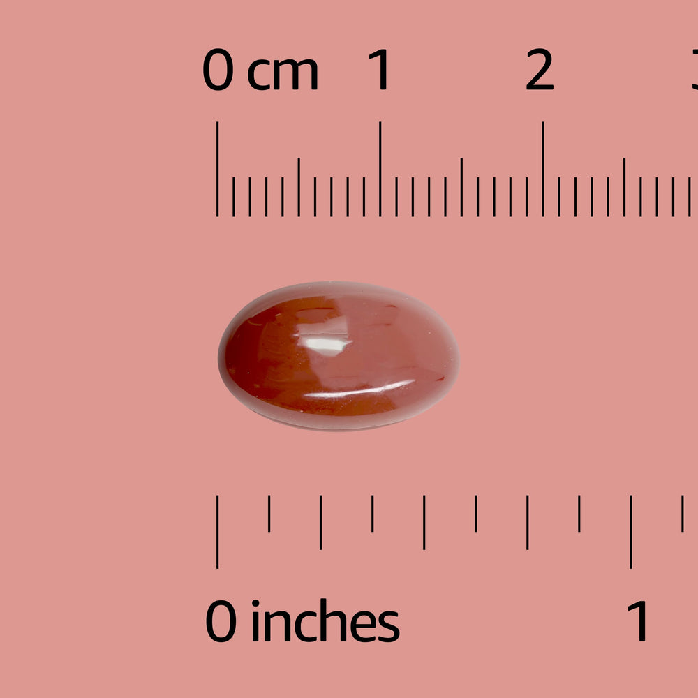 Closeup of Amazon Basics CoQ10 softgels capsules highlighting energy production