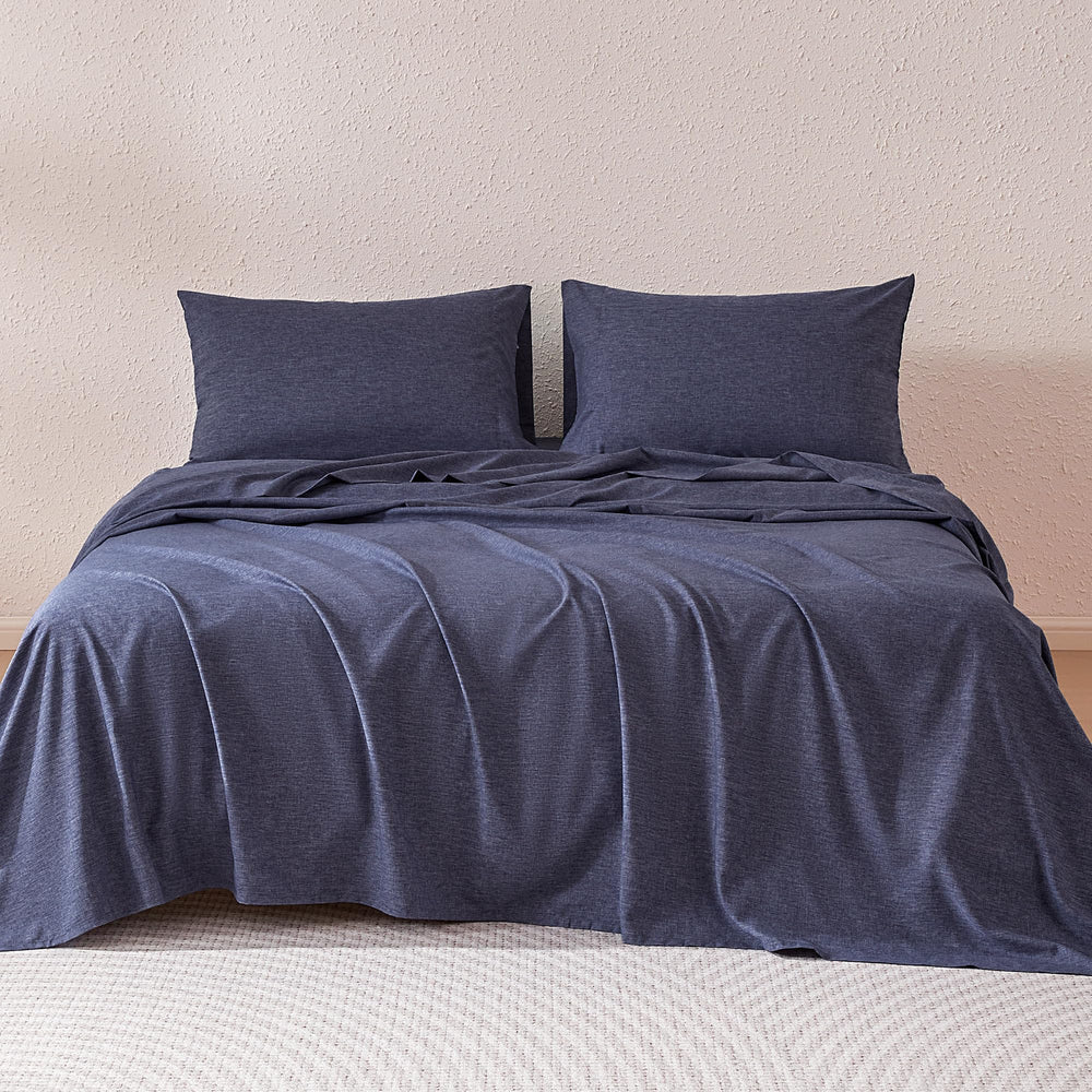 Amazon Basics blue fitted sheet with deep pocket ensures secure, wrinkle-free fit.