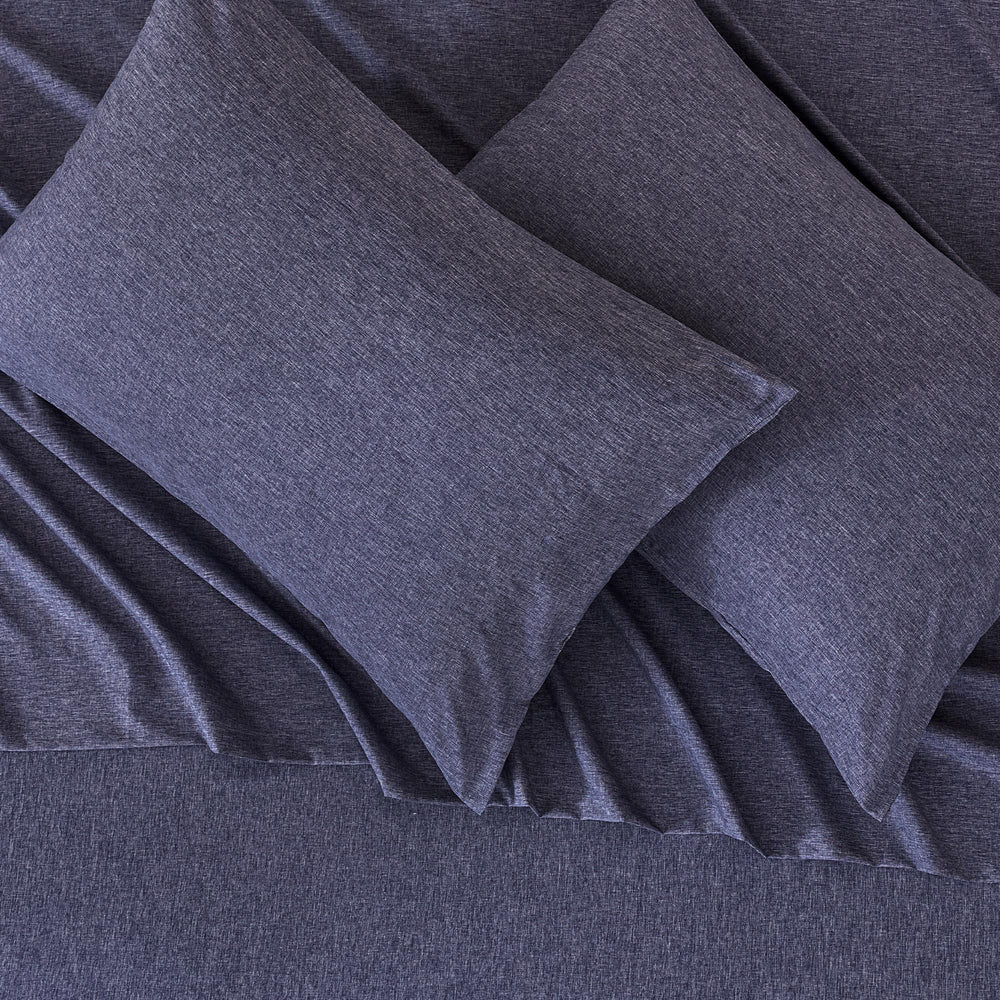 Amazon Basics blue pillowcase delivers a soft texture for restful nights.