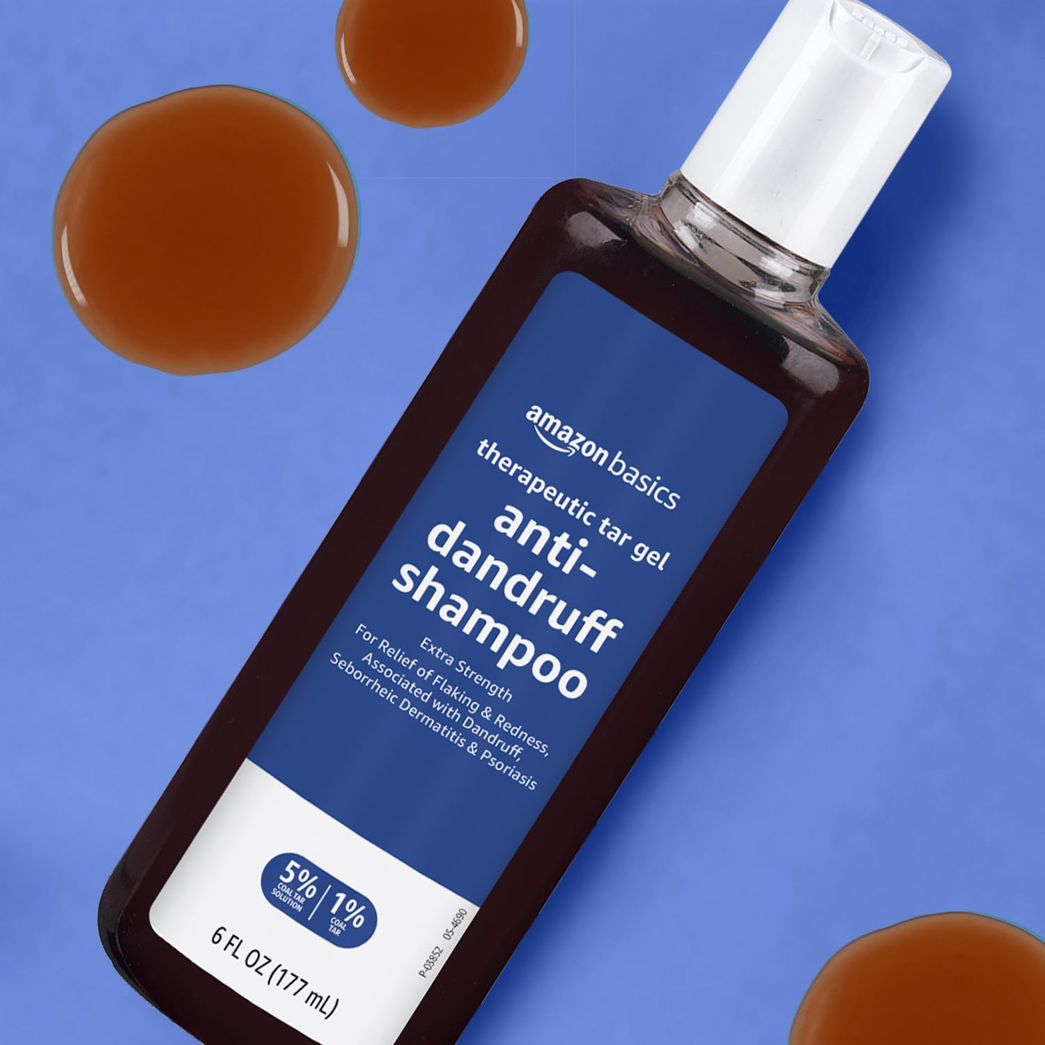 Distinct coal tar scent noted in Amazon Basics shampoo