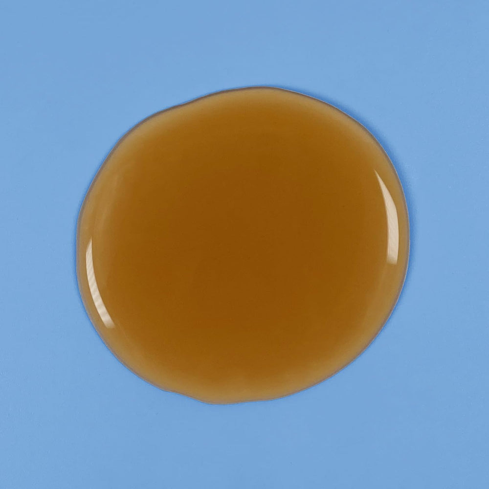 Close-up of Amazon Basics Therapeutic Plus Tar Gel label featuring coal tar content.