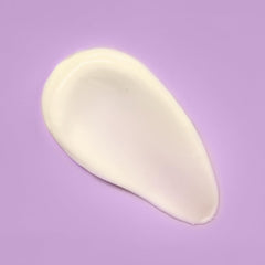 Gently massaging the cream onto face and neck in use