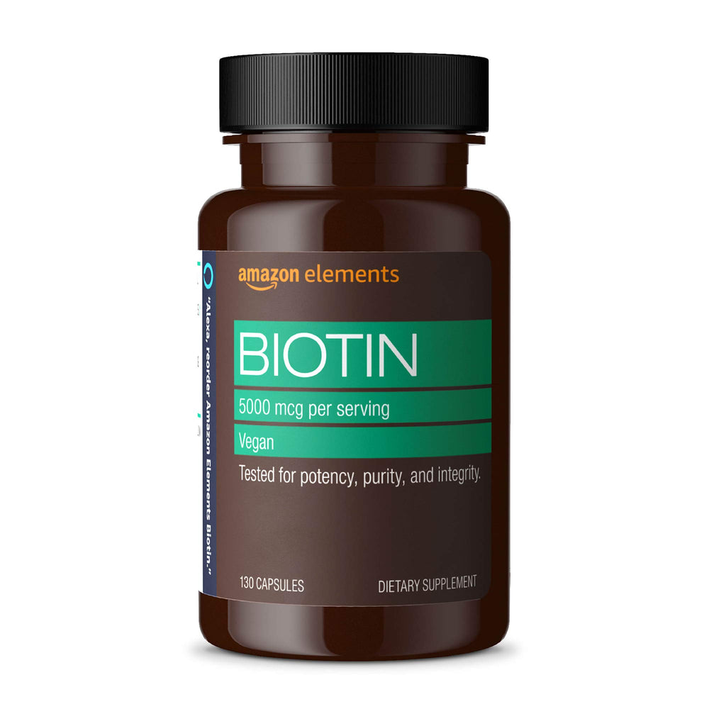Amazon Elements Biotin 5000 mcg bottle close-up highlighting hair and nails support.