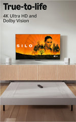 Amazon Fire TV Stick 4K Max remote close-up with Alexa enables quick voice searches.