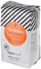 Close-up of Amazon Fresh Colombia coffee beans for authentic Arabica quality