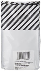Amazon Fresh Colombia ground coffee beans close-up reveals rich texture.