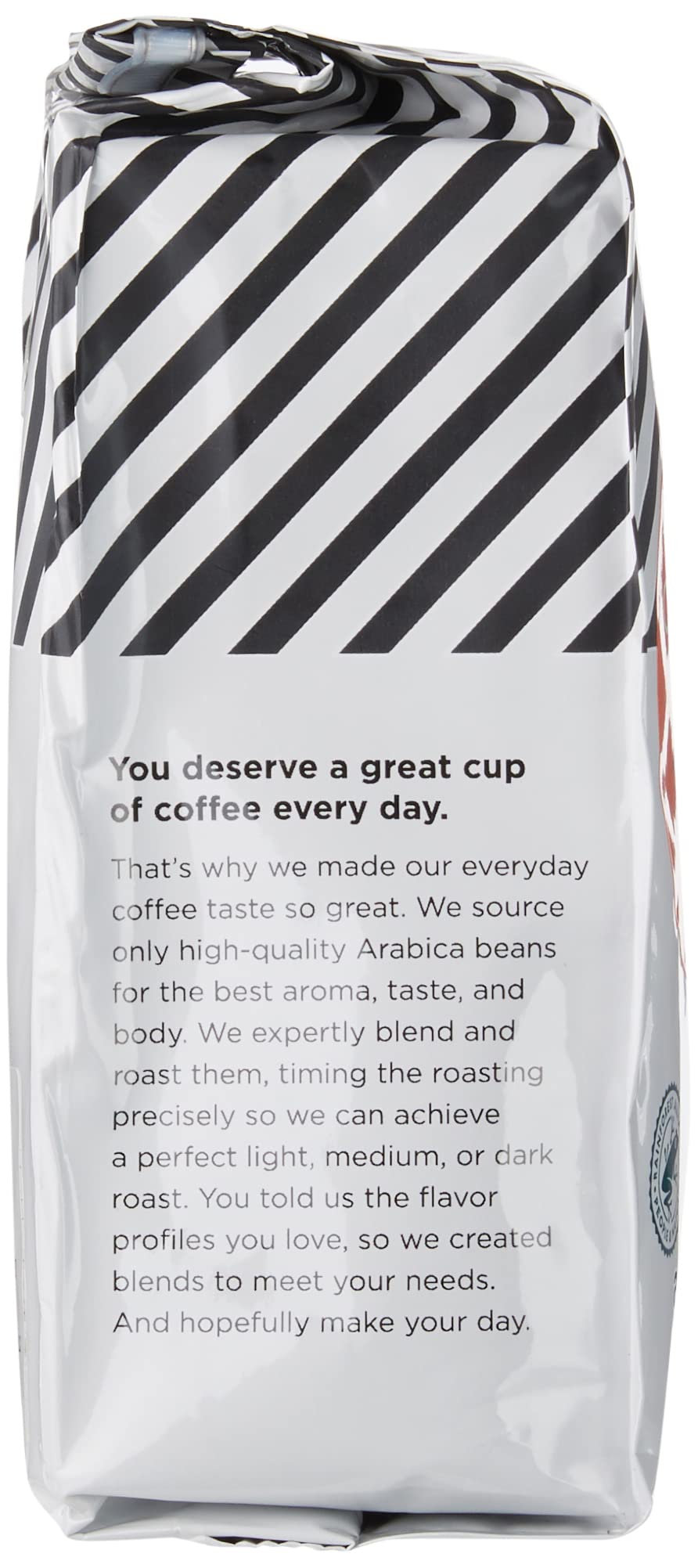 Amazon Fresh Colombia ground coffee roasted beans close-up.