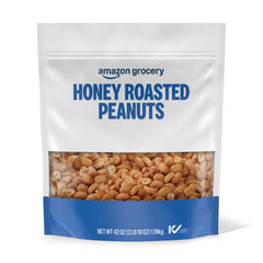 Amazon Grocery Happy Belly honey roasted peanuts in a 42 oz bag for snacking.
