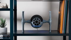 Amazon STAR WARS TIE Fighter Stand dimensions help with shelf planning.