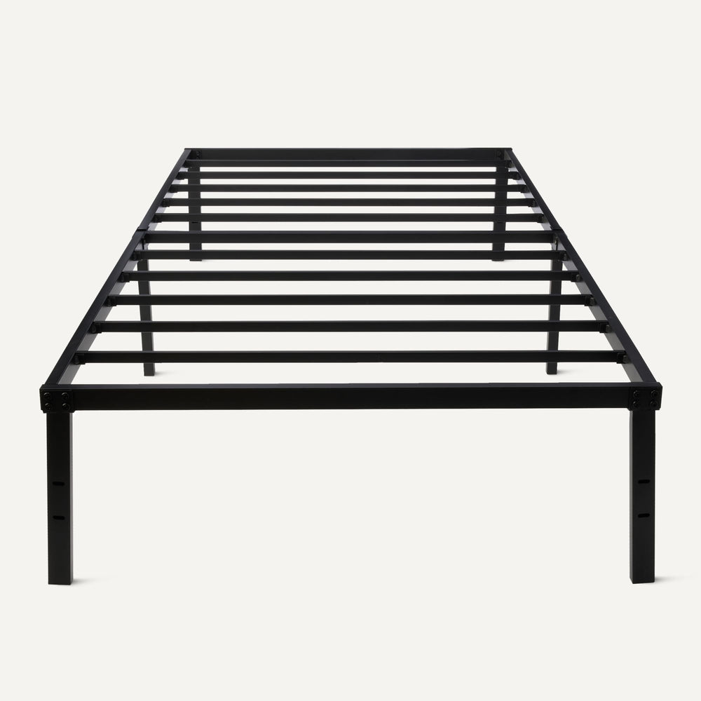 Amazon Basics bed frame with protective floor pads preventing floor scratches.