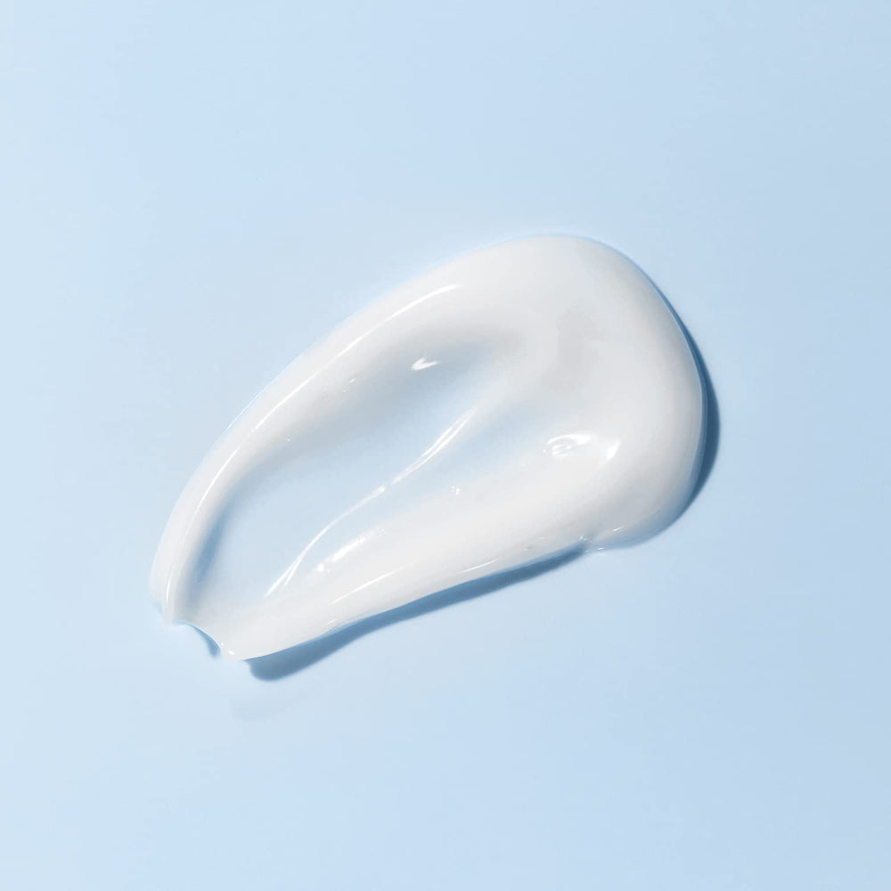 Amazon Basics Moisturizing Cream fragrance-free label signals gentle care.