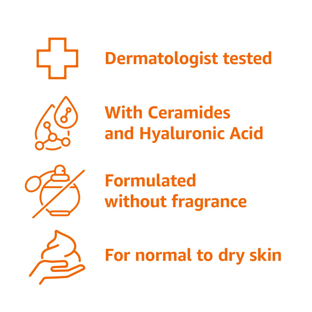 Applying Amazon Basics Moisturizing Cream demonstrates daily-use hydration.