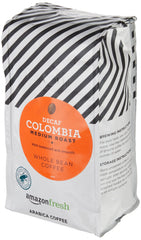 Amazon Fresh Decaf Colombia coffee beans close-up shows glossy beans and full-bodied potential.