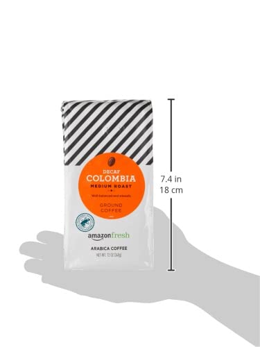 Serving idea with AmazonFresh Decaf Colombia coffee cup and pastry.