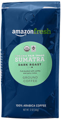Amazon Fresh Sumatra ground coffee label highlights organic and fair-trade status.