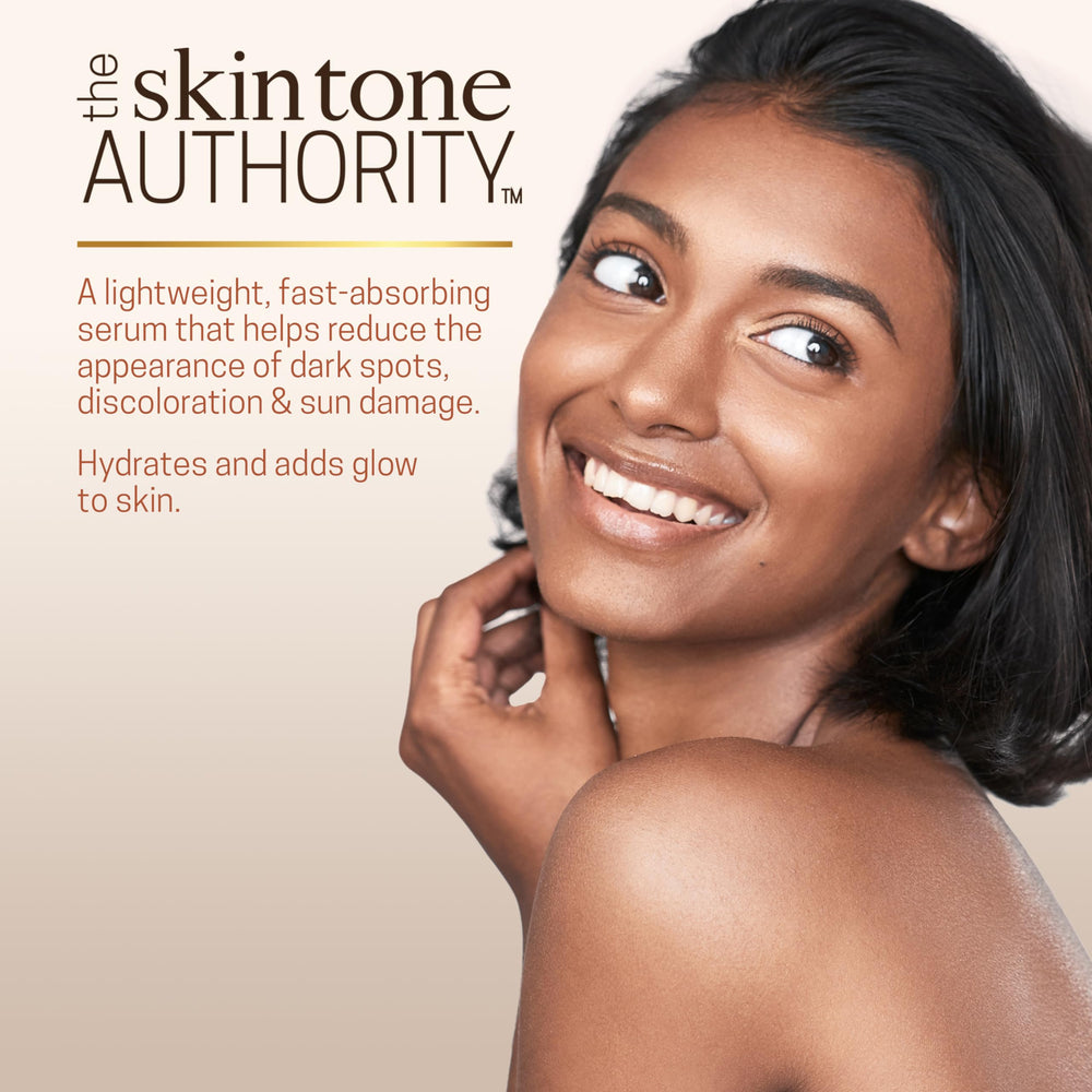 Ambi Even & Clear serum dropper close-up for precise daily application.