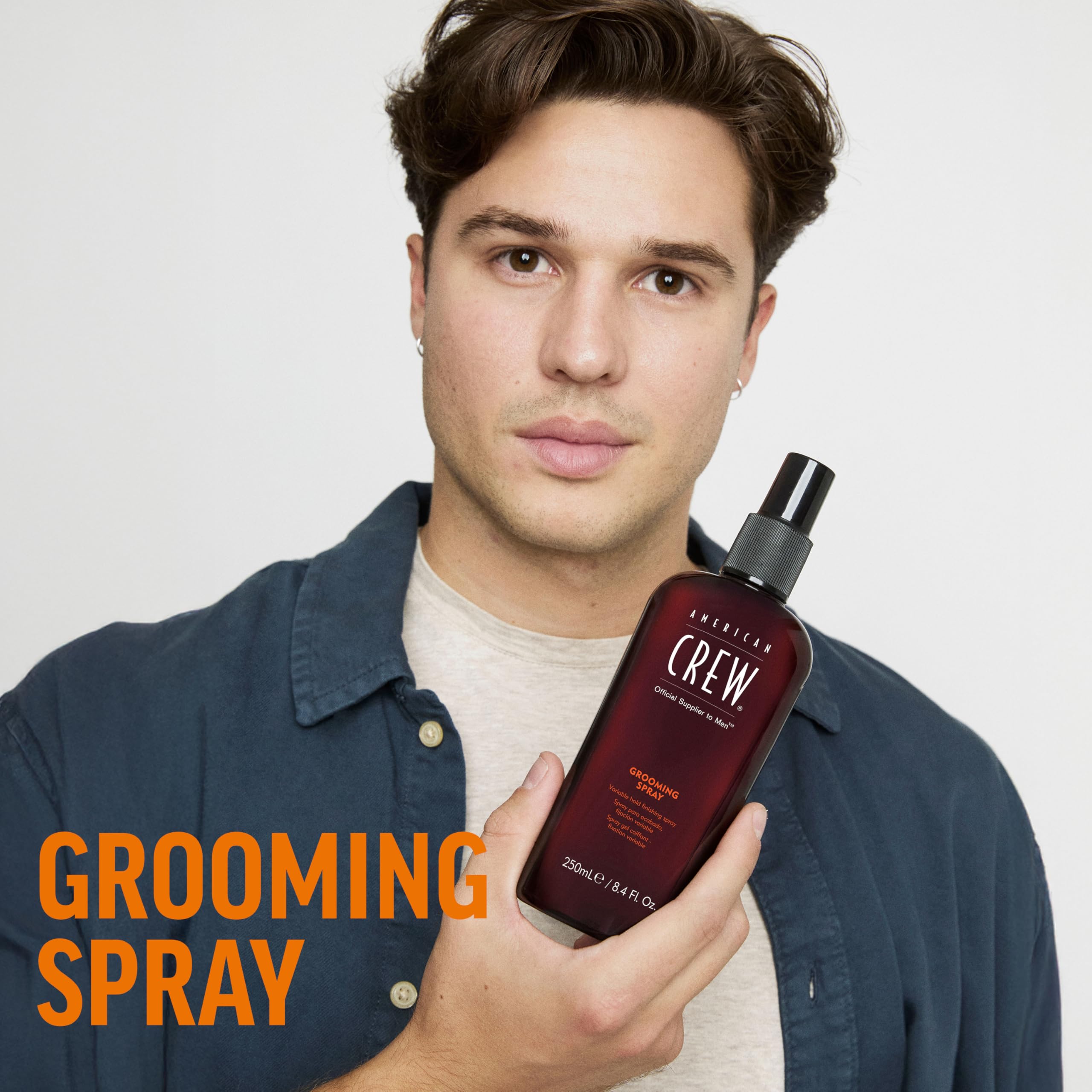 American Crew Grooming Spray on dry hair for a softer natural hold
