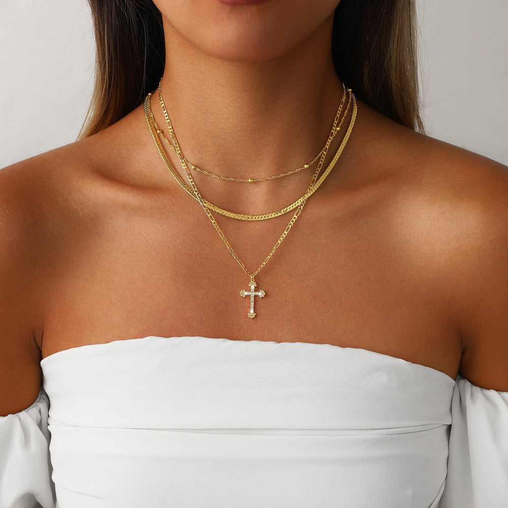 Amicon 14k gold-filled cross pendant close-up with shine
