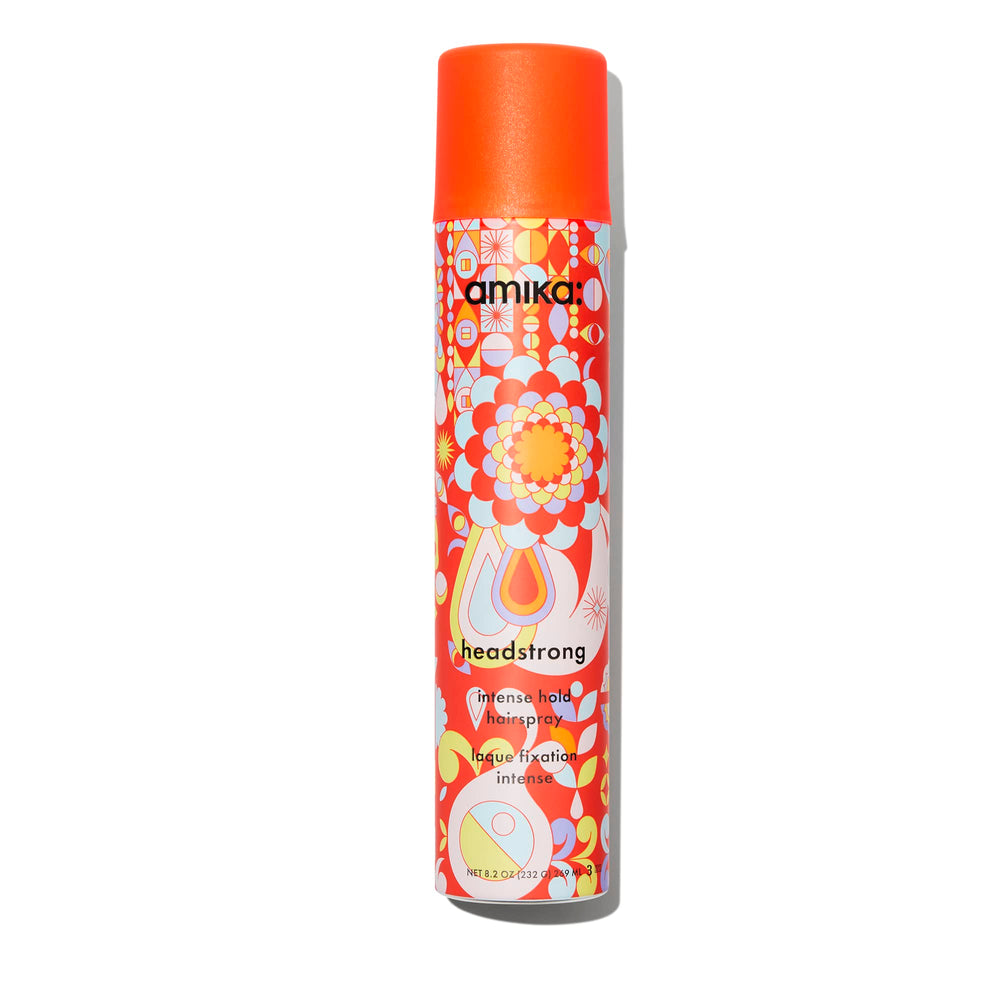 Amika Headstrong hairspray bottle showing strong hold with a light mist.