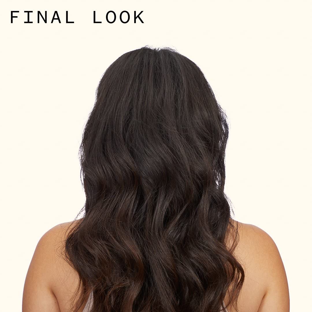 Amika Plus Size Perfect Body Hair Mousse foam on hand shows airy texture and light hold.