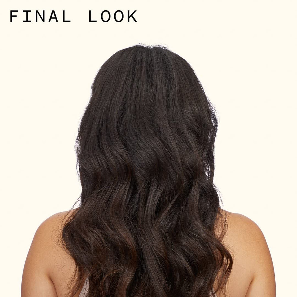 Amika Plus Size Perfect Body Hair Mousse foam on hand shows airy texture and light hold.