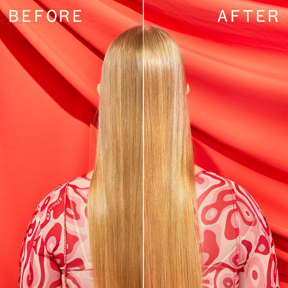 Amika Top Gloss Shine Spray on hair creates sleek, glossy strands