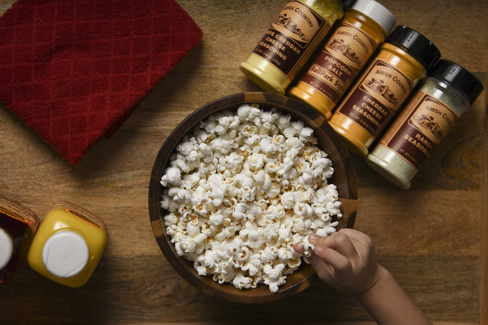 Amish Country Popcorn Non-GMO Gluten-Free badge indicating dietary suitability