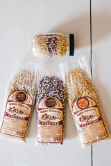 Amish Country Popcorn variety-pack front view showing three kernels