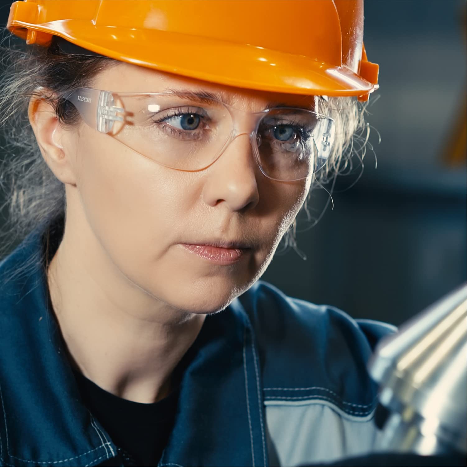 Amoolo Impact-resistant lenses endure debris during construction tasks